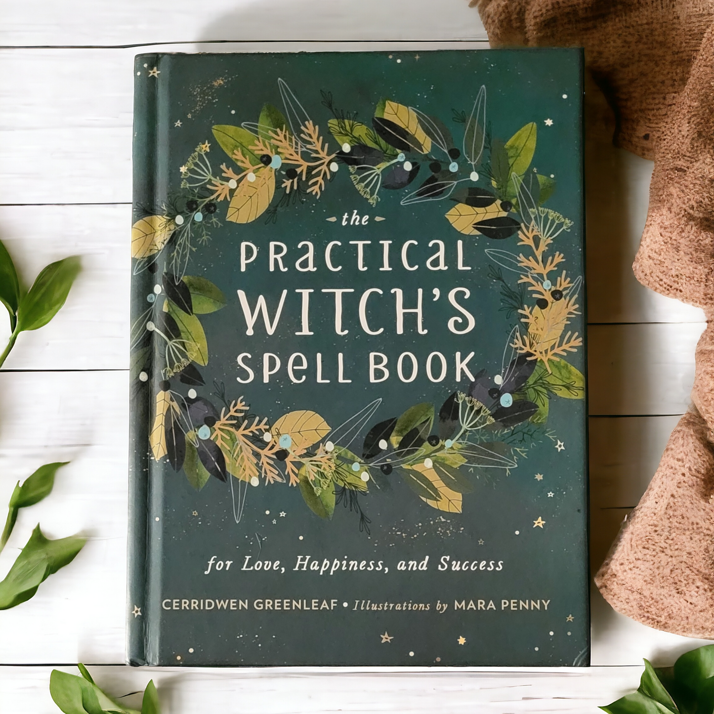 (Pre-Loved) The Practical Witch's Spell Book: For Love, Happiness, and Success by Cerridwen Greenleaf